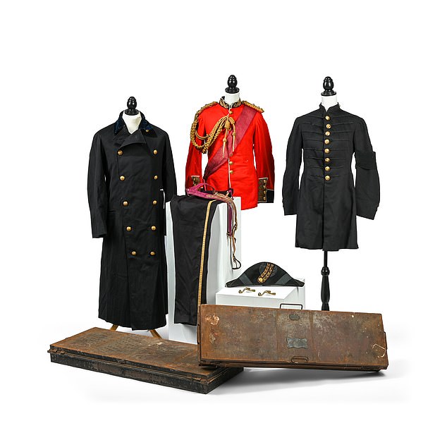 The first uniform, lot 390, dates from when Yorke was an Equerry to Prince Leopold and consists of a scarlet tunic with blue facings and gold embroidery; blue trousers with gold lace; a blue frock coat with mourning bands; and an overcoat