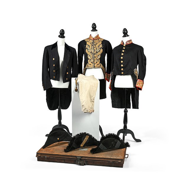 The other uniform, lot 388, dates from when he was a groom to Edward VII and bears the king's code on the buttons of the tailcoat.