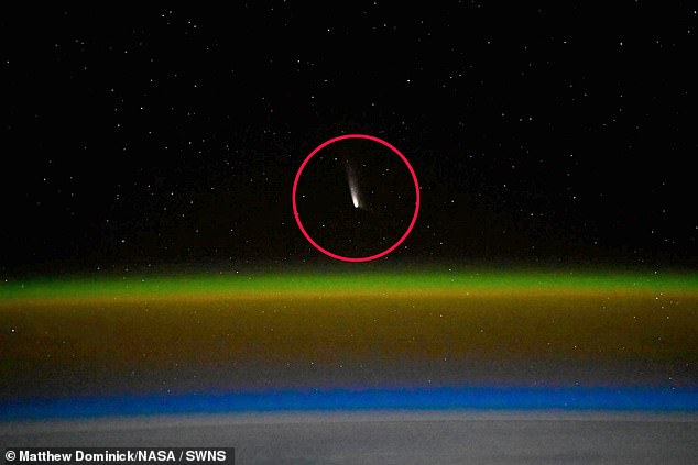 The comet is in the middle of an 80,000-year journey to the solar system - seen here on September 22, captured from space by NASA astronauts Don Petit and Matthew Dominick