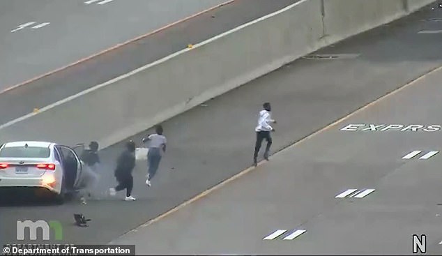 Moment four teens crash a stolen Kia and run off down busy Minnesota highway as the TikTok-fueled 'Kia Boyz' craze swept the country