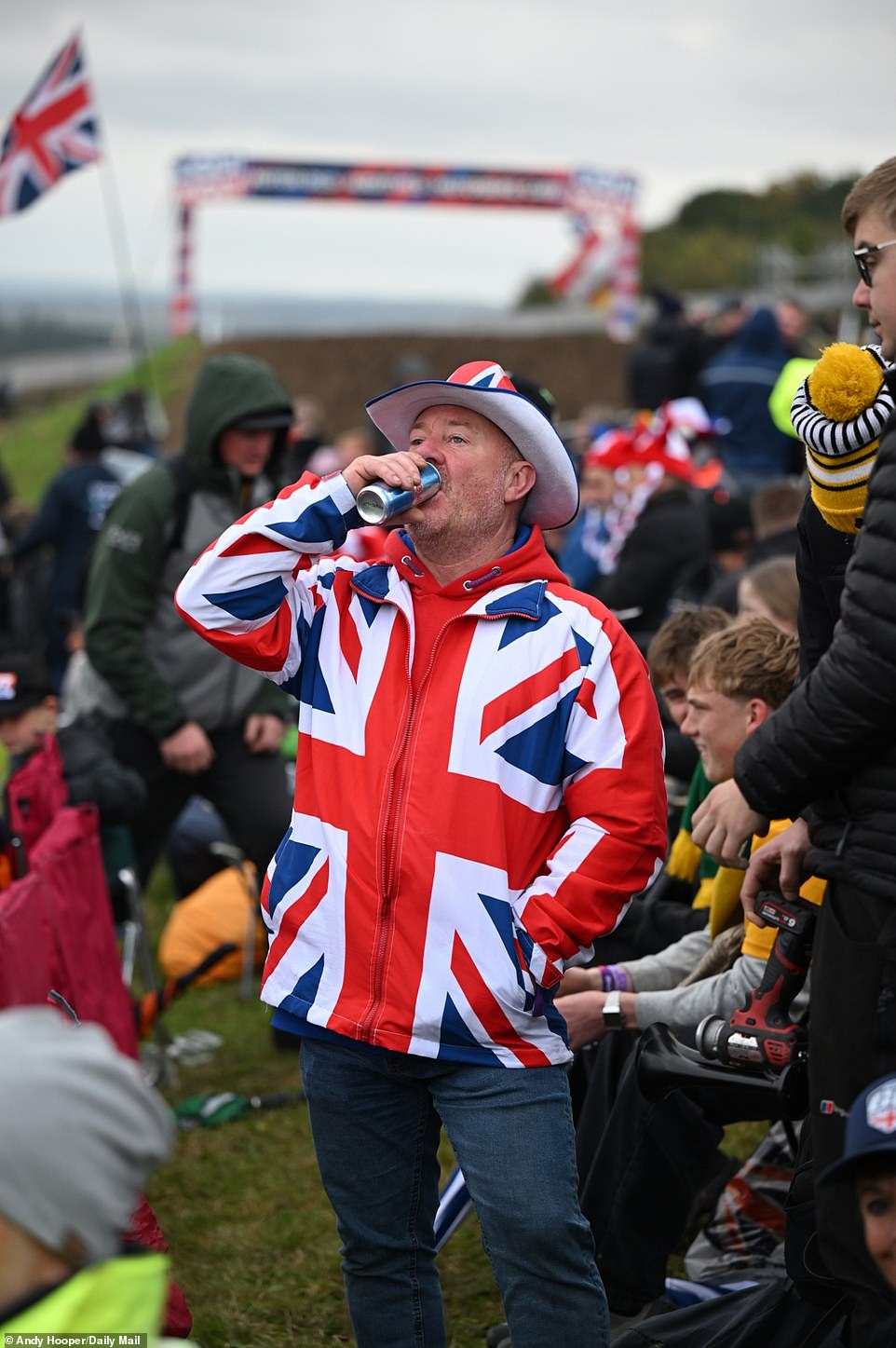 A British fan drinks a can of Red Bull during the event in Hampshire, which was an exciting event