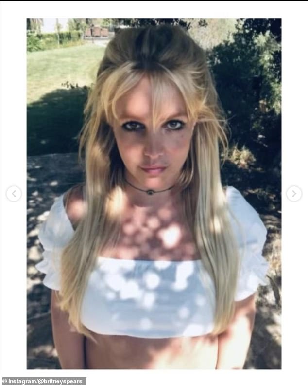 In the post, Britney shared identical selfies as she posed outside under a shady tree that shielded her from the bright sun