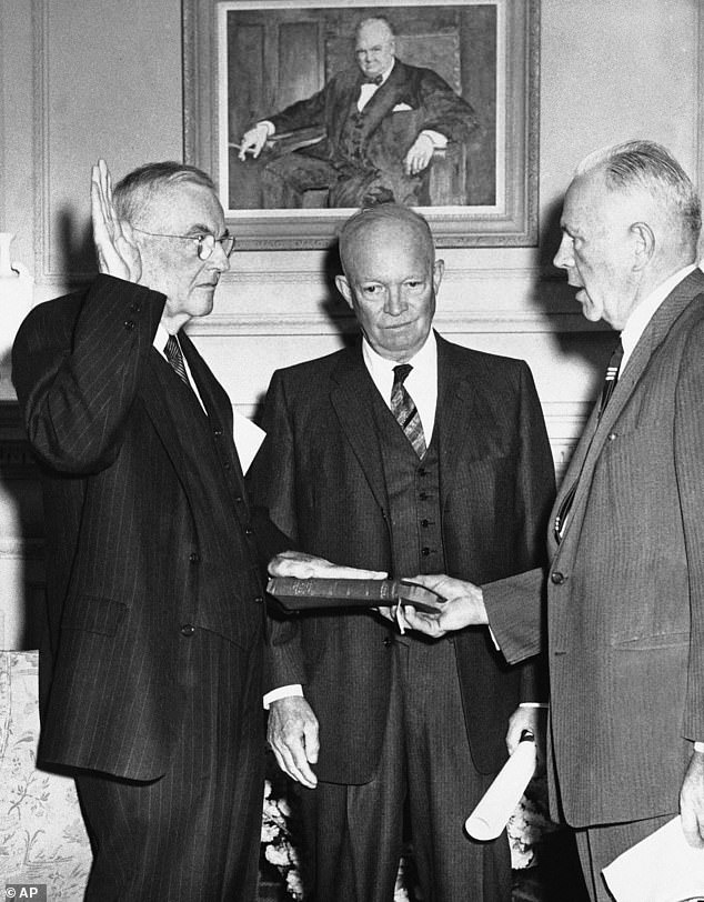 Former Secretary of State John Foster Dulles, left, is sworn in as special foreign policy advisor on April 23, 1959. President Dwight Eisenhower attended the ceremony