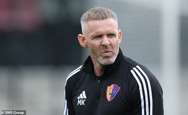 East Kilbride manager Mick Kennedy has called on authorities to crack down on racism