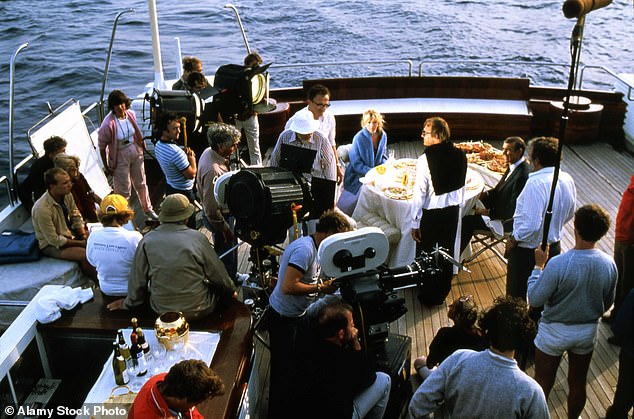 FILE PHOTO: Filming of the 1983 James Bond film Never Say Never Again is pictured aboard a ship then called the Nabila and owned by Saudi businessman Adnan Khashoggi