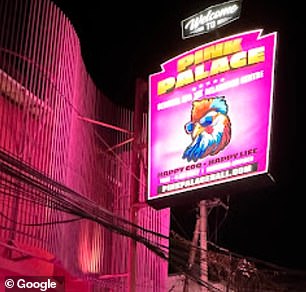 The venue's neon sign, with the words 'Happy Coq, Happy life', has now been draped by the Bali Police