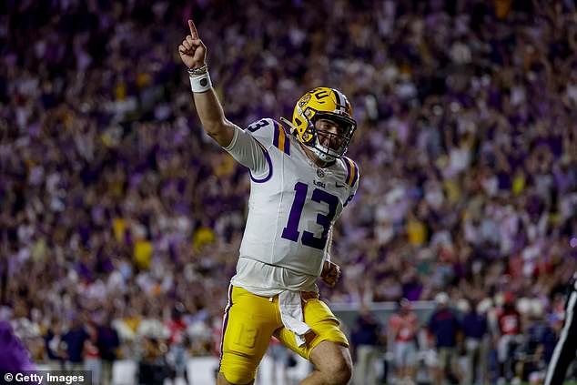 Garrett Nussmeier #13 of the LSU Tigers celebrates during the first half against Ole Miss