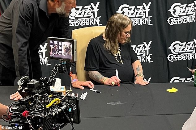 Ozzy prepared to sign autographs