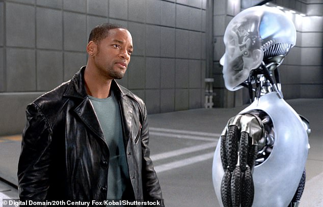 Tesla's Optimus bears a striking resemblance to Sonny, the fictional robot protagonist from the film starring Will Smith (pictured)