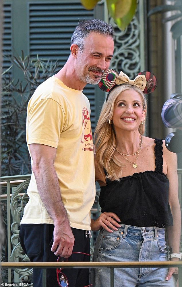 Gellar looked adoringly at her husband as they posed for a photo together