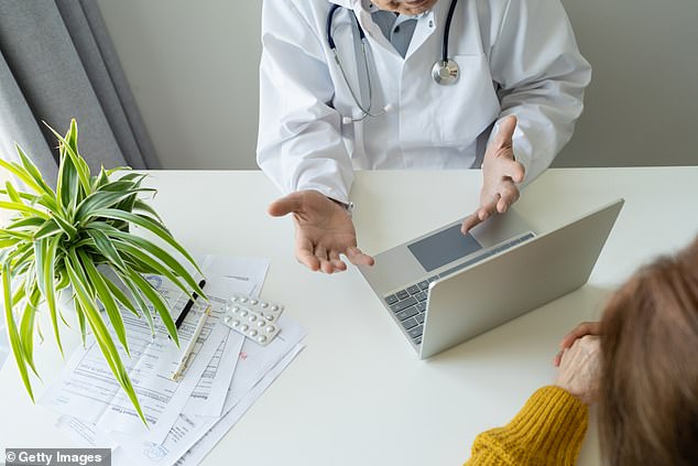 A doctor talks to a female patient in front of a laptop in a clinic. The survey of 2,000 British women revealed interesting information