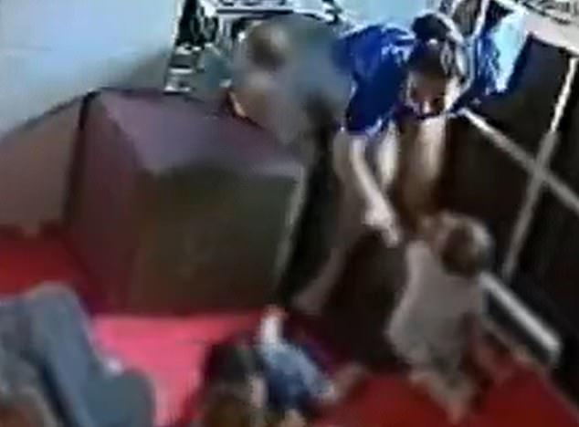 Video shows a childcare worker in Brazil slapping a one-year-old girl on the buttocks just before her colleague bit the baby's left arm