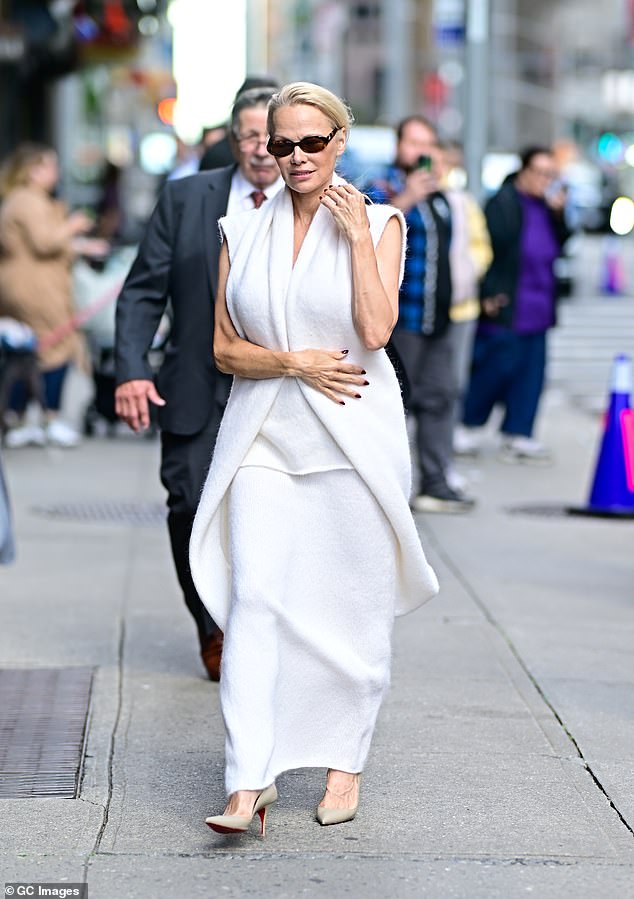 She turned the streets of the Big Apple into her runway as she walked around in a pair of taupe stiletto heels with red bottoms