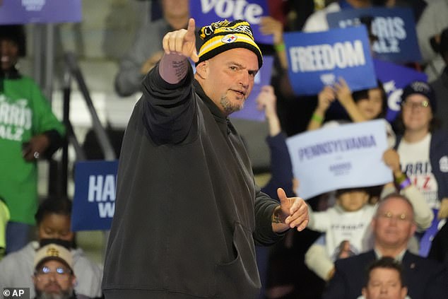 Pennsylvania Sen. John Fetterman showed up to the Erie rally wearing a Pittsburgh Steelers snow hat, called former President Donald Trump a 