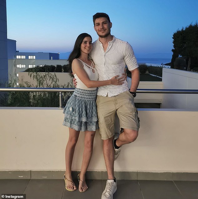 Troufanov, who has been held hostage for over a year, is pictured with his girlfriend