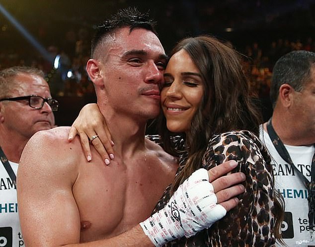 Tszyu (pictured with Constantine after winning a fight) is confident the referee will raise his hand at the end of his fight with the undefeated Russian on Sunday