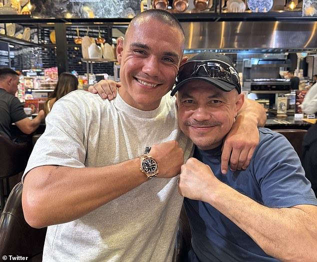 The Australian revealed that his famous father Kostya (pictured together) will be ringside on Sunday