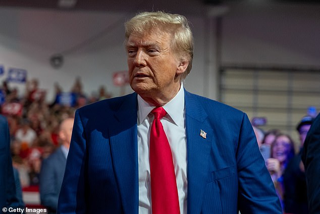 Donald Trump holds a town hall at the Greater Philadelphia Expo Center in Oaks, Pennsylvania on October 14, 2024. His rival, Democratic presidential candidate Vice President Kamala Harris, speaks in the western Pennsylvania city of Erie