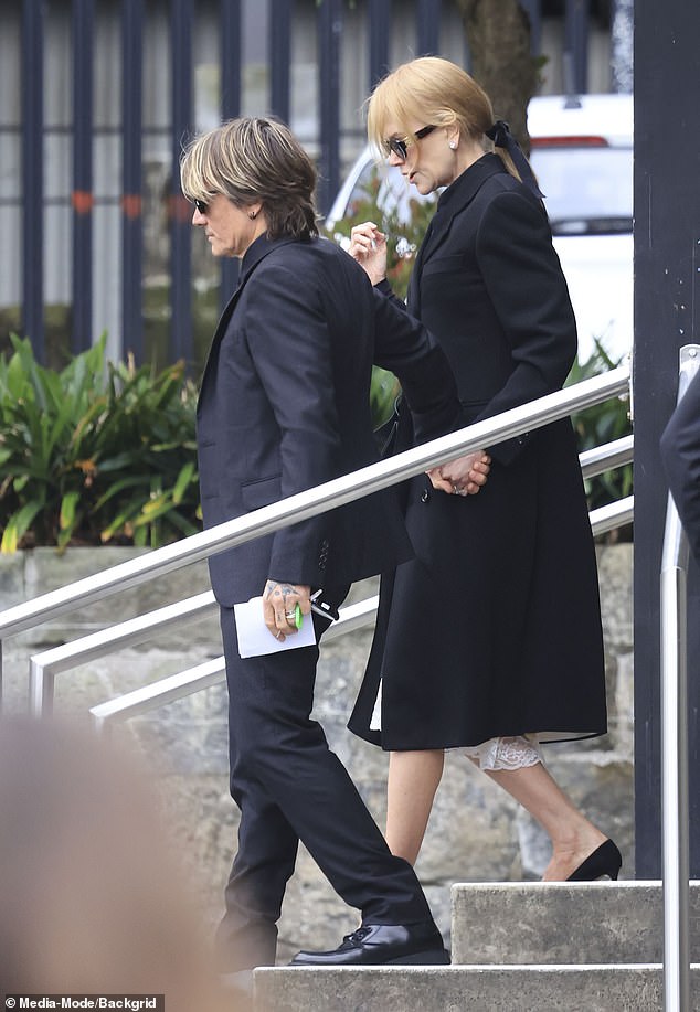 Nicole was seen arriving at the church hand-in-hand with her loving husband Keith, 56, as he supported her during the service.