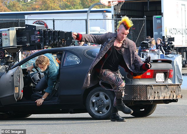 On one of the shots they were filming, both Butler and Smith ran away from their gray car for some reason