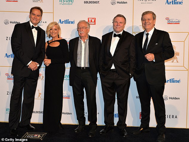 Charles Wooley (second from right) has paid tribute to the late George Negus (third from left). They are pictured with Liam Bartlett (left), Liz Hayes (second from left) and Ray Martin (right) at the 2018 Logies