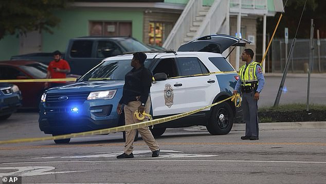 Officers are seen blocking some side streets in Raleigh as Thompson allegedly continued his killing spree