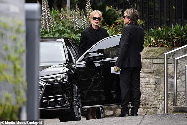 Keith held the car door open for her as she arrived to say goodbye to their beloved matriarch Janelle with her family