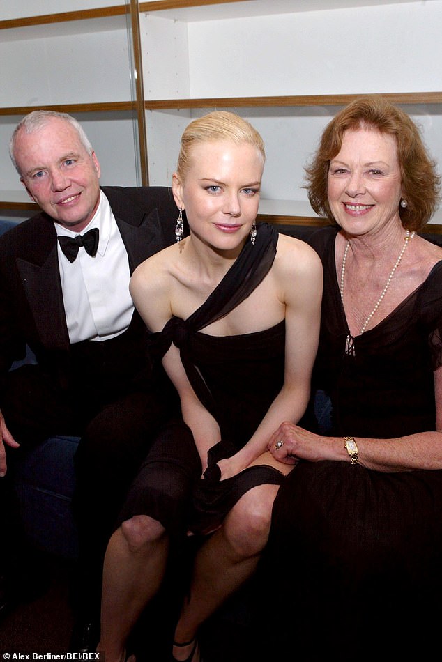 Nicole was left devastated when Antony, a respected psychologist, died of a suspected heart attack in Singapore in 2014 at the age of 75 (Nicole is pictured with her parents in 2003)