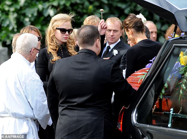 At her father's public funeral, Nicole was seen crying as she held her daughter, then six, to her chest on Sunday as pallbearers walked with Antony's coffin to the waiting hearse.