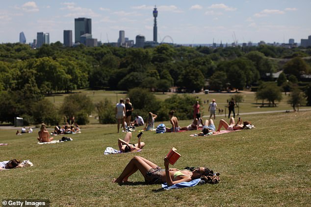 In recent years we have seen record-breaking temperatures and heatwaves worldwide, including the UK's hottest record in July 2022. Pictured: Primrose Hill in London on July 10, 2022 during a heatwave