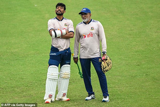 Hathurusinghe (right) has been suspended and will be fired later this week