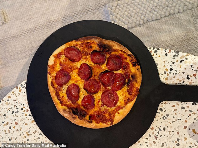 You're better off saving your money and cooking the pizza in your standard kitchen oven