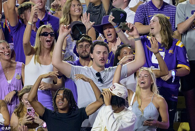 Skenes and Dunne were seen waving during the game, which LSU won 29-26