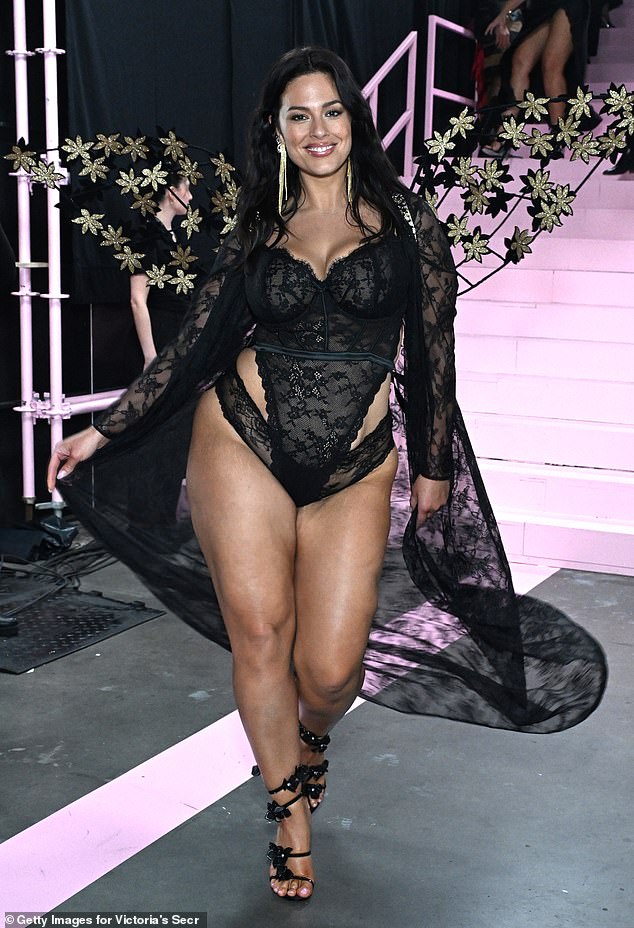 Graham graced the runway in a figure-hugging black lace bodysuit layered over a matching thong with thick straps