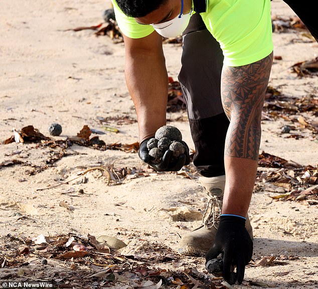 1729061050 402 Mysterious black balls that washed up on one of Australias