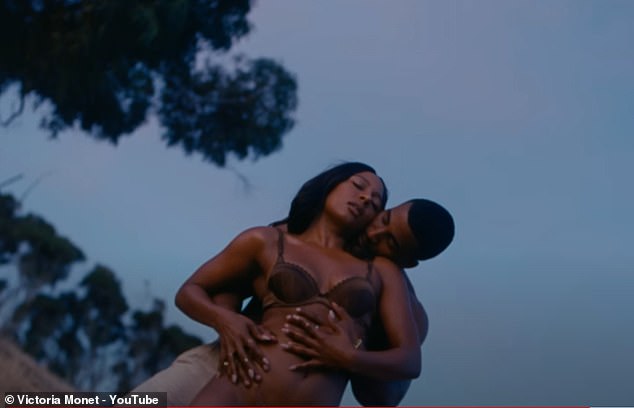 Victoria and her ex John put on a very steamy display in the video for her hit Moment