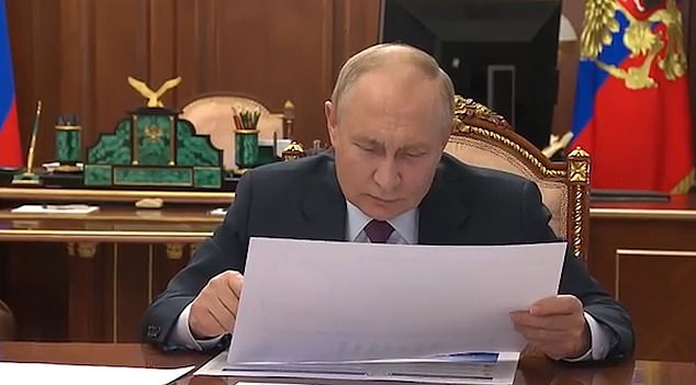 Putin was visibly confused and lowered his head to look at the map before realizing he had made a mistake