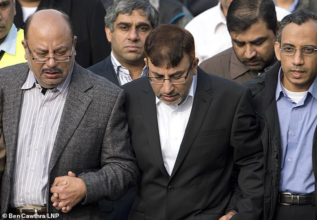 Father Dr. Abdul Shakoor was the only survivor of the arson. He is pictured leading other members of the local Muslim community as they follow the funeral procession in 2012