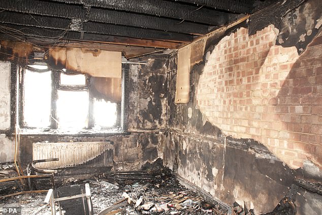 The significant damage to the family home in Harlow, Essex, after the fatal fire in October 2012