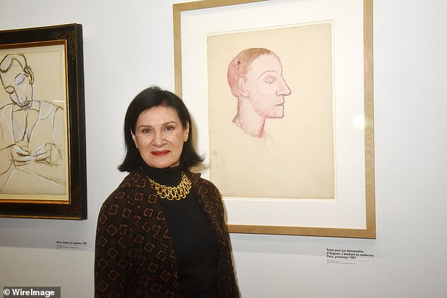 Paloma Picasso pictured next to her father's work in 2023