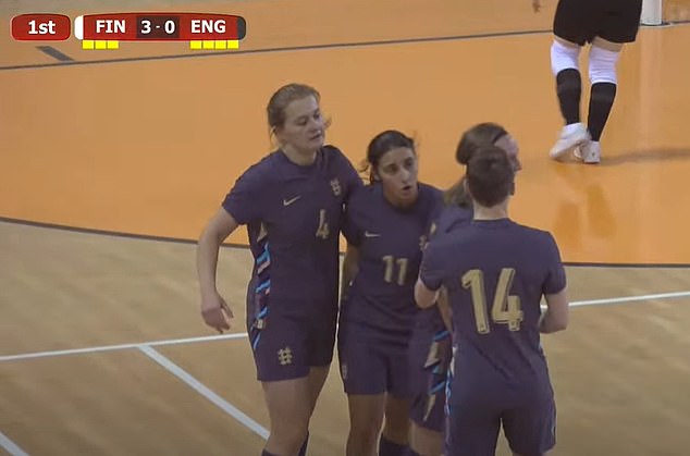 Her teammates flocked to celebrate with her, with England losing the match 5–2