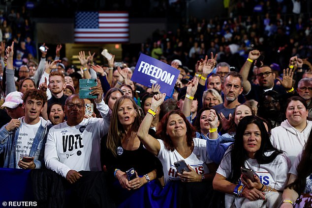 Supporters react during a campaign rally for Democratic presidential candidate and U.S. Vice President Kamala Harris in Erie, Pennsylvania.