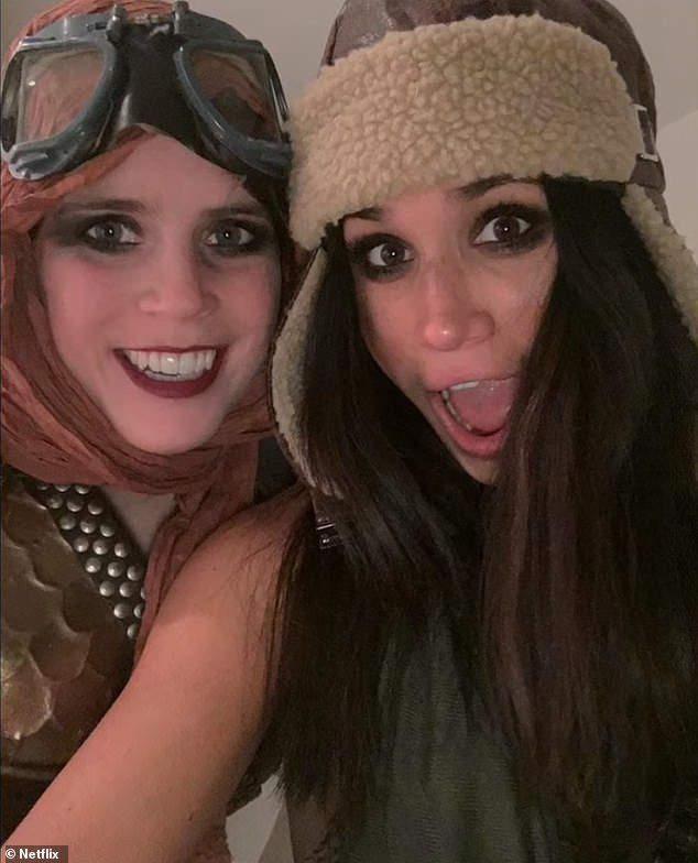 In a snap from the big night out, Meghan can be seen posing for a playful selfie with Princess Eugenie