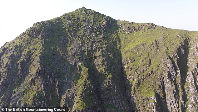 Heartbreaking footage shows 'waterfalls' of litter cascading down Wales' highest mountain, dumped by careless climbers