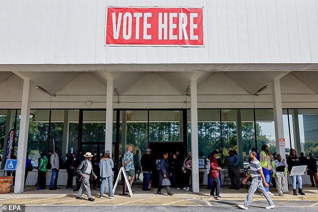 More than 300,000 voters cast their ballots on the first day of early voting in Georgia starting Tuesday