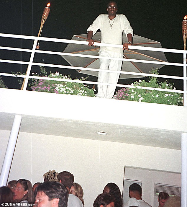 News of Sean 'Diddy' Combs' arrest last week has left some celebrities 'terrified' about their reputations, an industry expert said. Pictured: Diddy watches his Labor Day party from his balcony at his East Hampton home on August 29, 1998