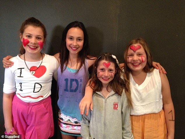 I'm pictured on the far left with my sister and two family friends, before a One Direction concert in 2013