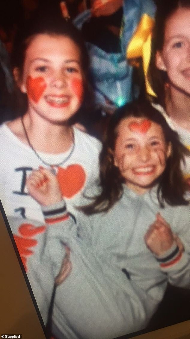 We painted red love hearts on our faces and made homemade merchandise for our first 1D concert