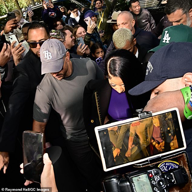 Outside the venue, the 12-time Grammy nominee showed off her star power with the large number of devoted Barbz fans who surrounded her at the entrance