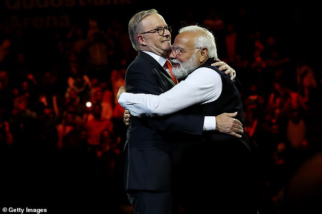 It's the first time India has been included in Australia's Working Holiday program, with leaders claiming the visa will strengthen ties between the two countries (Photo: Indian Prime Minister Narendra Modi and Australian Prime Minister Anthony Albanese embrace)